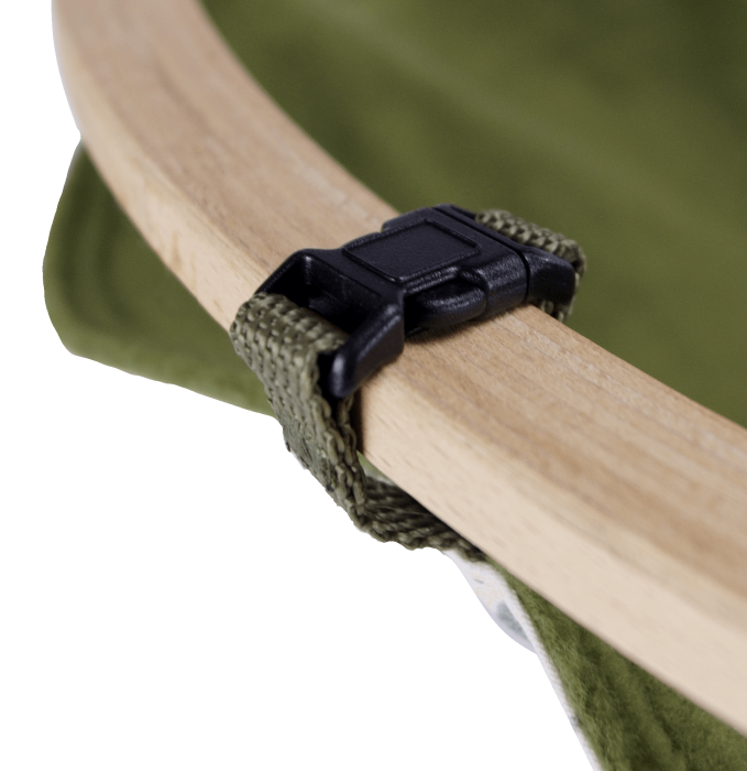 The picture shows a cover for the ferret swing. The cover was sewn from a vintage fabric and complemented with polar fleece in olive green